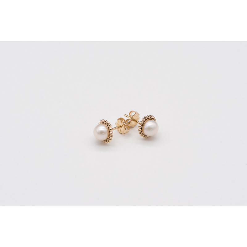 White freshwater pearl studs with gold-filled twisted setting