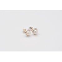 White AAA freshwater pearl studs with 925 silver bezel setting