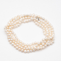 Long white freshwater pearl necklace with clasp