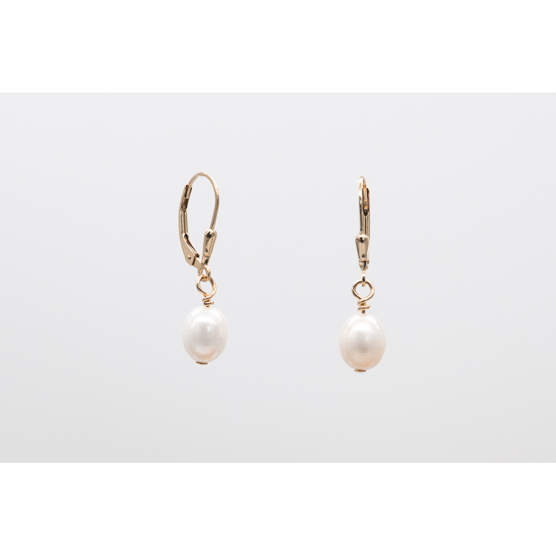 White oval freshwater pearl earrings with gold-filled lever-back